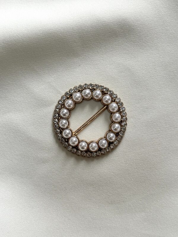 Radiant Pearl Circle Buckle with Rhinestone Accents Collection