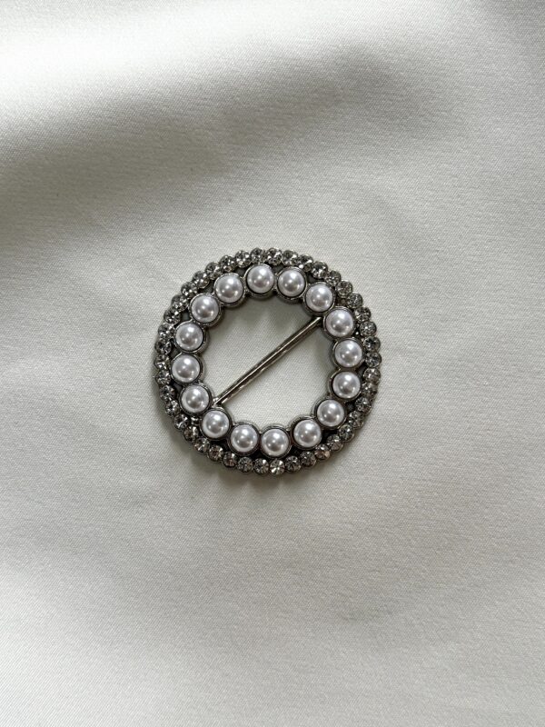 Radiant Pearl Circle Buckle with Rhinestone Accents Collection