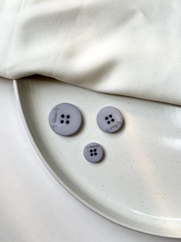 Signature Luxe Button Collection