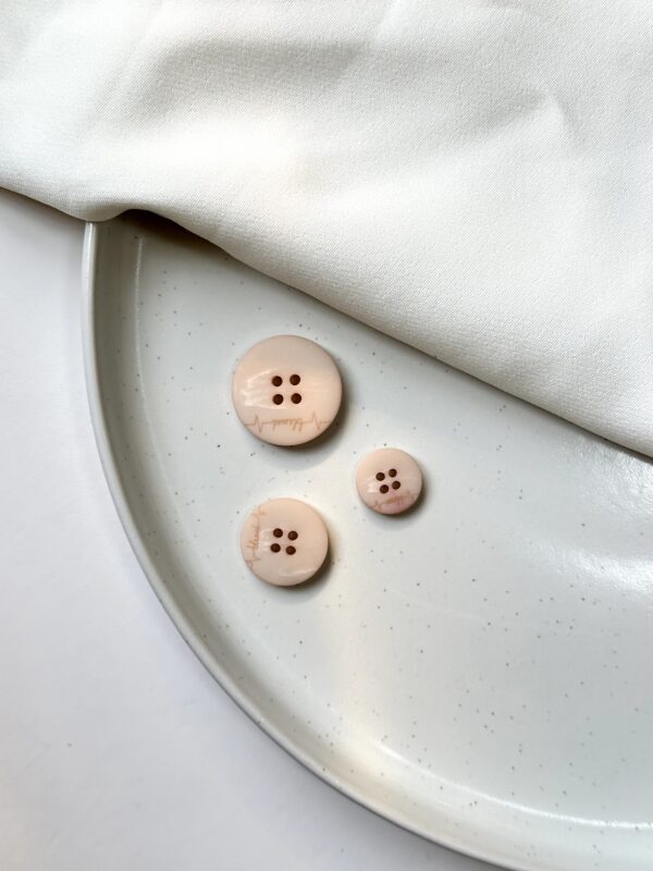 Signature Luxe Button Collection
